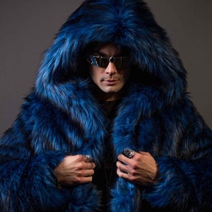 Green coat with blue fur hood sales