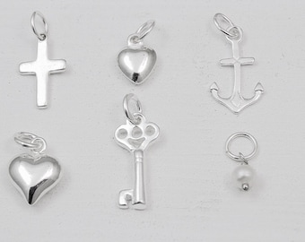 ADD 925 solid Sterling Silver charms.