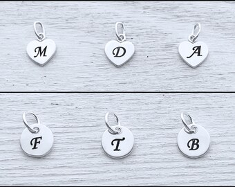 Add 925 Sterling Silver HEAR Or DISC Heart 7 mm with Initial. OR numbers 0  to 9. Two numbers doesn't fit.