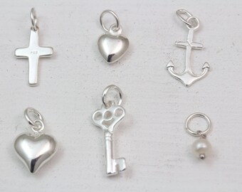 ADD 925 solid Sterling Silver charms.