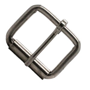 May include: Silver metal buckle for a belt or strap. The buckle is rectangular with rounded corners and a smooth finish.