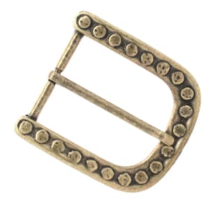 May include: Antique gold-toned metal buckle with a decorative border of small circles.