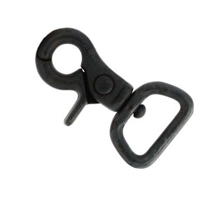 May include: A dark gray metal swivel snap hook with a spring-loaded clasp and a rectangular loop. The hook is designed for attaching to a variety of items, such as straps, leashes, or bags. The metal has a matte finish.