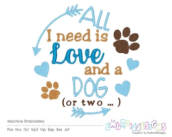 May include: Machine embroidery design featuring a blue circle with arrows, hearts, and paw prints. The text reads "ALL I need is Love and a DOG (or two...)"
