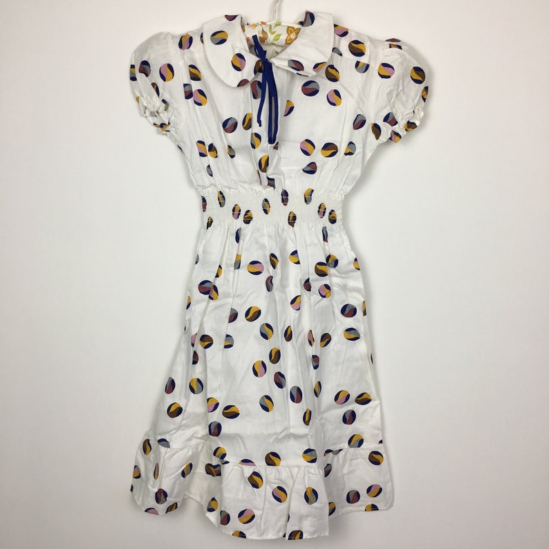 Vintage 1960s 1970s white needlecord summer fall cotton dress tunic Unusual spotty marble print Yellow ribbon Age 6 7 8 9 10 11 12 years