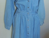 Vintage faded blue 80 39 s -90 39 s denim dress.The dress has a shirt style motif with a 13 button front closure. Long sleeves, gathered at waist.
