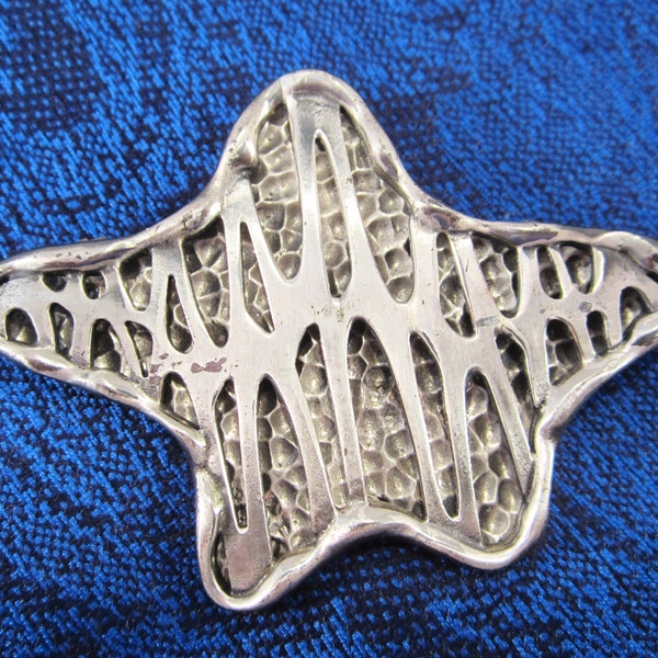 Coro Brooch-this vintage silver tone metal abstract piece is probably circa 1960's-1970's.The design is unique with a modernistic funky look