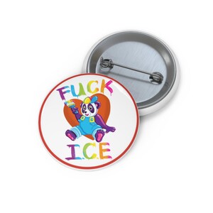 May include: A white button with a cartoon panda holding a colorful ice cream cone, set against a red heart. The text "FUCK ICE" is written in rainbow colors around the panda.