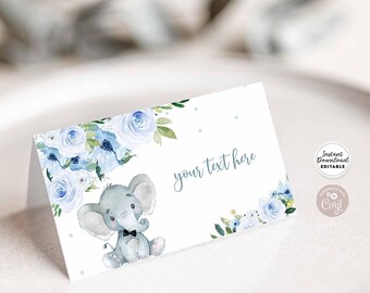 May include: Blue and white baby shower place card with a cute elephant illustration and floral design. The text "your text here" is included on the card.
