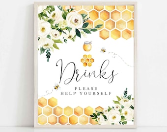 May include: A printable sign with a white background and a honeycomb pattern in yellow and gold. The sign says "Drinks Please Help Yourself" with white flowers and a bee illustration. The sign is for a party or event.