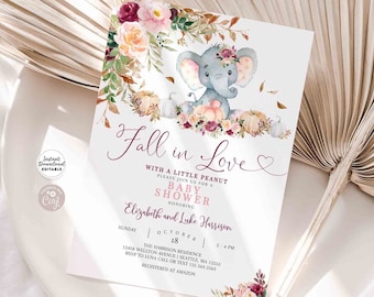 Puede incluir: Invitación a un baby shower con una ilustración de elefante, calabazas y flores. El texto dice "Fall in Love" e incluye detalles del evento. El diseño es una "Plantilla editable de descarga instantánea".