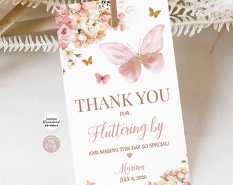 May include: Pink and gold butterfly thank you tag with floral accents. The tag says "Thank You for Fluttering by and Making This Day So Special!" with the name Marina and the date July 8, 2020.