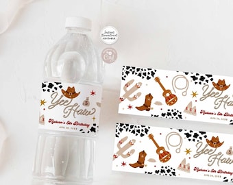 May include: Printable water bottle labels with a cowboy theme. The labels feature a black and white cow print background with a red, brown, and gold cowboy boot, guitar, cactus, and lasso. The text on the label says "Yee Haw!" and "Hudson's 5th Birthday".