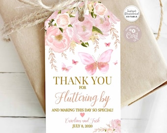 May include: Pink floral thank you tag with butterflies and gold glitter accents. The tag says "Thank you for fluttering by and making this day so special!" with the names "Carolina and Jack" and the date "July 8, 2020".
