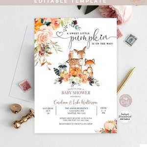 May include: A white baby shower invitation with a watercolor illustration of a deer, raccoon, fox, and owl surrounded by fall leaves and pumpkins. The text reads "A sweet little pumpkin is on the way!" and includes details for the baby shower, such as the date, time, location, and RSVP information.