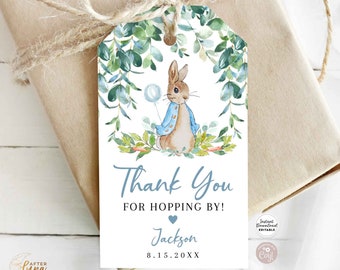 Puede incluir: Una etiqueta de agradecimiento azul y verde con una ilustración de acuarela de un conejo sosteniendo un globo. La etiqueta dice "¡Gracias por venir!" con un corazón y el nombre "Jackson" y la fecha "8.15.20XX".