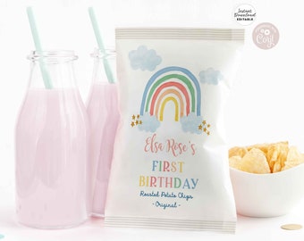 May include: A white chip bag with a rainbow, clouds, and gold stars. The text on the bag reads "Elsa Rose's First Birthday Roasted Potato Chips - Original - "