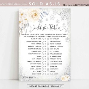 May include: A printable bridal shower game with a winter theme. The game is called "Would She Rather" and features a white background with snowflakes and white roses. The game asks guests to choose between two options for each question, such as "Sleep in Late" or "Get Up Early".