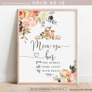 May include: Printable sign with a floral design and a cute woodland animal illustration. The sign says "Mom-osa bar" and includes instructions to "pour the bubbly, add some juice, top with fruit, enjoy".