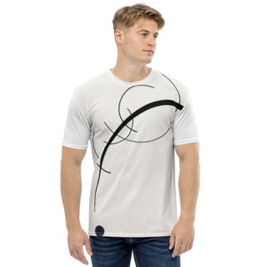 May include: White t-shirt with a black abstract design featuring a curved line and circles.