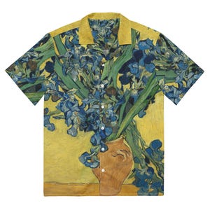 May include: A yellow short-sleeved button-up shirt with a print of a painting of blue irises in a vase. The painting is by Vincent van Gogh.