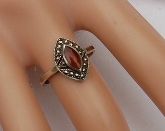 Vintage Art Deco Silver Ring with a fine cut Carnelian gem.       Unique design.
