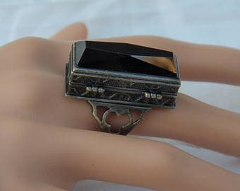 The most fantastic looking Coffin style Poison ring,  Large and Heavy with extra lock.  Great for small keepsakes. Most impressive.