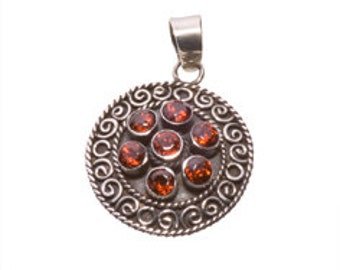 Fine Vintage  Silver Pendant.   Garnet gem and a Silver Chain.