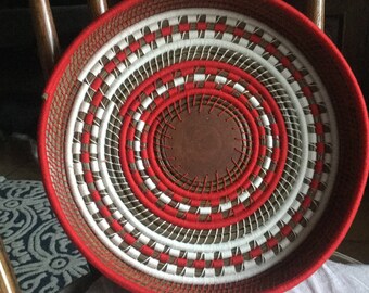 Pine Needle Basket, wrapped with red and white cotton, wood base.  Meticulously handmade, original design. Earthy & beautiful!