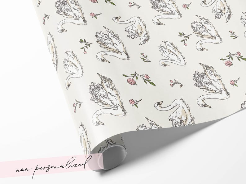 Non personalized swan wrapping paper roll mockup with ivory background blush floral sprigs and graceful bird illustration for romantic wedding gift packaging