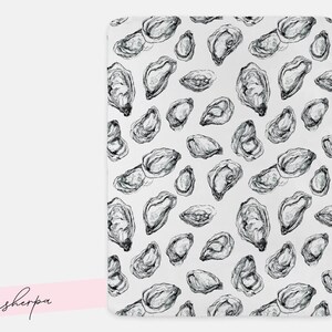 May include: A white blanket featuring a repeating pattern of black and grey oyster illustrations. The oysters are depicted in a detailed, realistic style, with varying sizes and orientations across the surface.