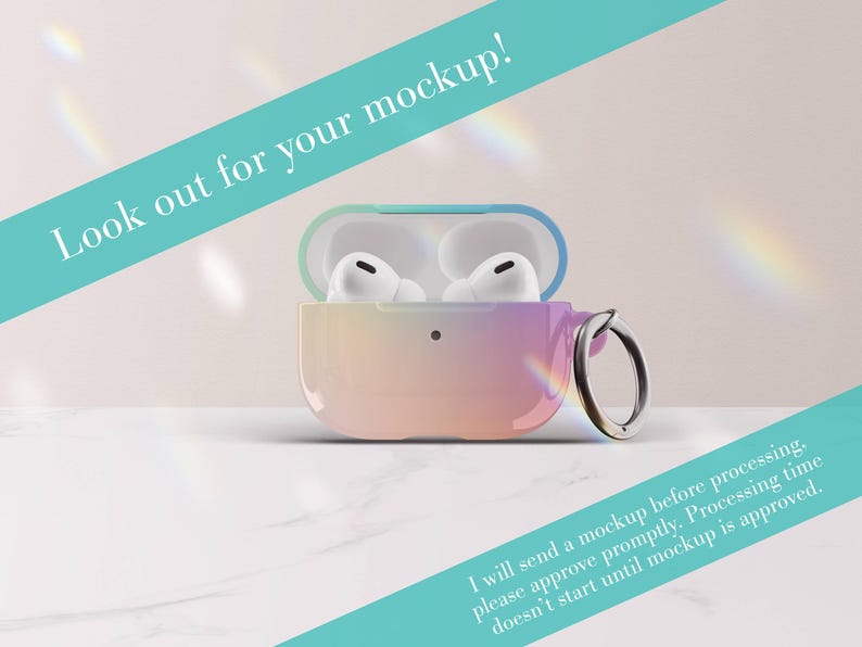 May include: A protective case for wireless earbuds featuring a smooth gradient transition from teal to pink and orange. The case is open, revealing white earbuds inside, and includes a silver metal ring attachment. Text reads: Look out for your mockup!
