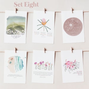 May include: Set of eight printable cards with watercolor illustrations and inspirational quotes. The cards feature a variety of floral designs, landscapes, and abstract patterns. Each card includes a Bible verse.