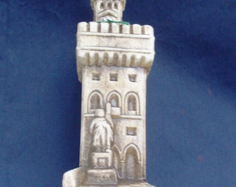 bottle decanter vintage, souvenir San Marino Italy, bottle contains almond amaretto, bottle-shaped castle San Marino