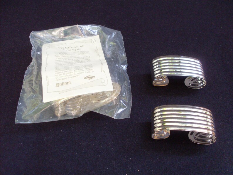 napkin ring built by the Italian company Inoxriv for the Italian company Buitoni 6 steel napkin ring coated with pure silver high thick