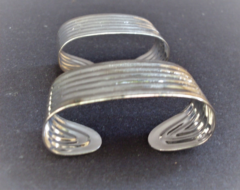 napkin ring built by the Italian company Inoxriv for the Italian company Buitoni 6 steel napkin ring coated with pure silver high thick