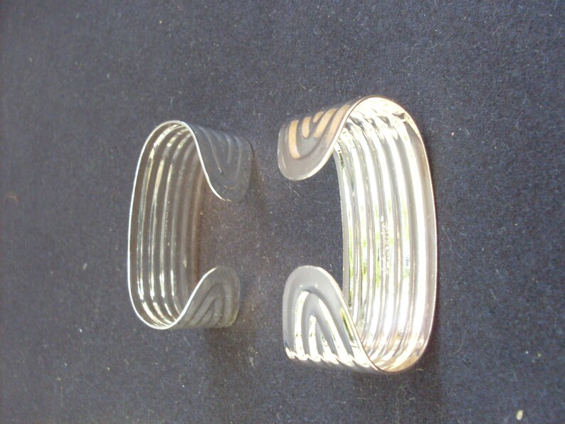 napkin ring built by the Italian company Inoxriv for the Italian company Buitoni 6 steel napkin ring coated with pure silver high thick