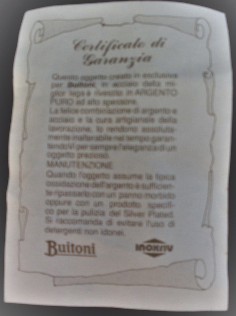 napkin ring built by the Italian company Inoxriv for the Italian company Buitoni 6 steel napkin ring coated with pure silver high thick