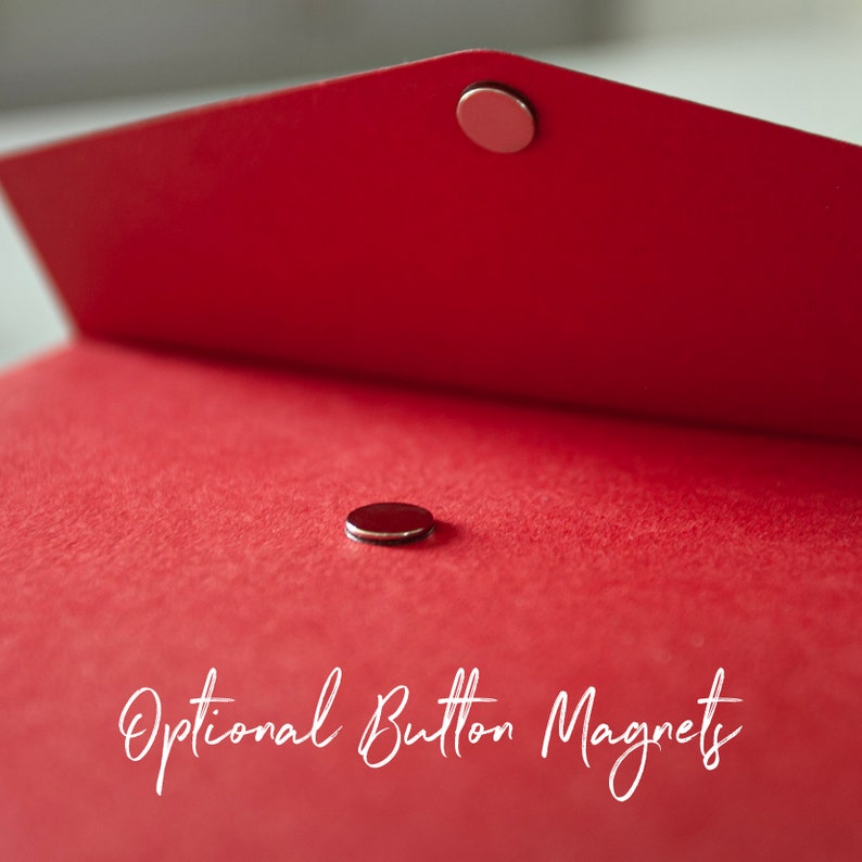 May include: Close-up of two silver button magnets on a red fabric surface. The text "Optional Button Magnets" is visible at the bottom of the image.