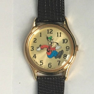 Disney Lorus Gold Backwards Goofy Watch! New! Retired! Very Difficult to Find In Mint Condition!