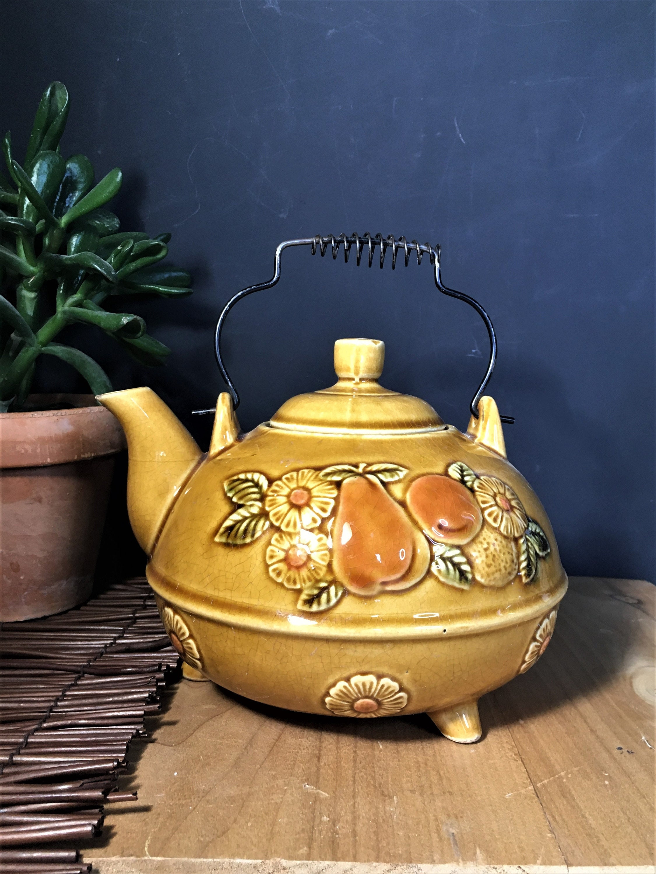 Vintage Ceramic Fruit and Flower Embossed Footed Teapot, Wire