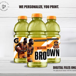 May include: Three yellow sports drink bottles with personalized labels featuring a basketball player, the text "MESSIAH AH BROWN", and a tiger logo. The labels also include the text "HIGH SCHOOL BASKETBALL TEAM" and "BALL TEAM NAME SENIOR NIGHT".