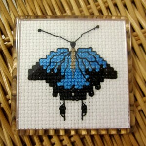 Hand cross stitched Australian fauna magnet - Ulysses Butterfly.
