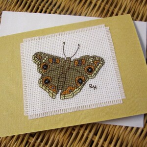 Hand cross stitched Australian fauna card - Meadow Argus Butterfly.  Light tan coloured card, white envelope, white paper insert.