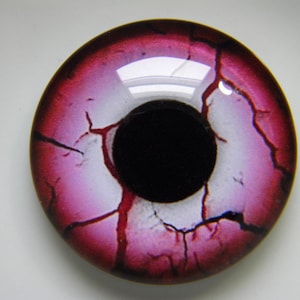 Glass eyes, monster eyes, mauve red monster eyes, zombie eyes, red zombie eyes, cabochon eyes, creature eyes.  Choose size from menu.