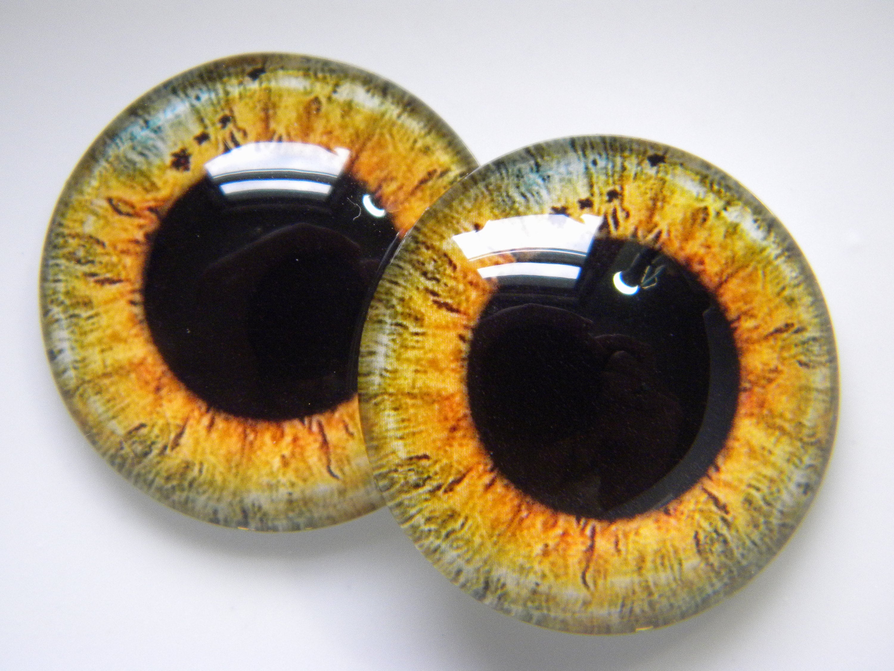 Glass Eyes, large pupil eyes, golden eyes, doll eyes, gold doll eyes, cabochon eyes, owl eyes.  Please choose size from drop-down menu.
