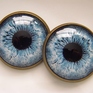 Glass eyes, sew on eyes, blue eyes, doll eyes, button eyes, loop back buttons, stuffed animal eyes.  One pair - Choose size from menu.
