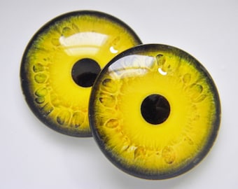 Glass eyes, monster eyes, yellow monster eyes, zombie eyes, yellow zombie eyes, cabochon eyes, creature eyes.  Choose size from menu.