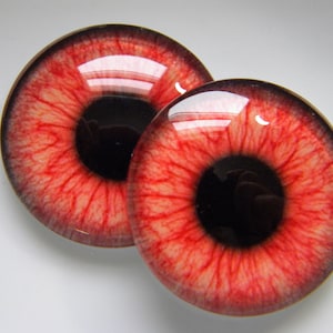 Glass eyes, monster eyes, red monster eyes, zombie eyes, red zombie eyes, blood shot eyes, creature eyes.  Choose size from menu.