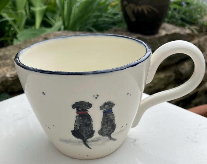 Handmade hand painted white ceramic tea or coffee cup in with hand painted two dogs design free delivery